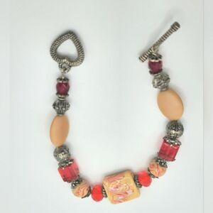 Orange silver glass beaded bracelet